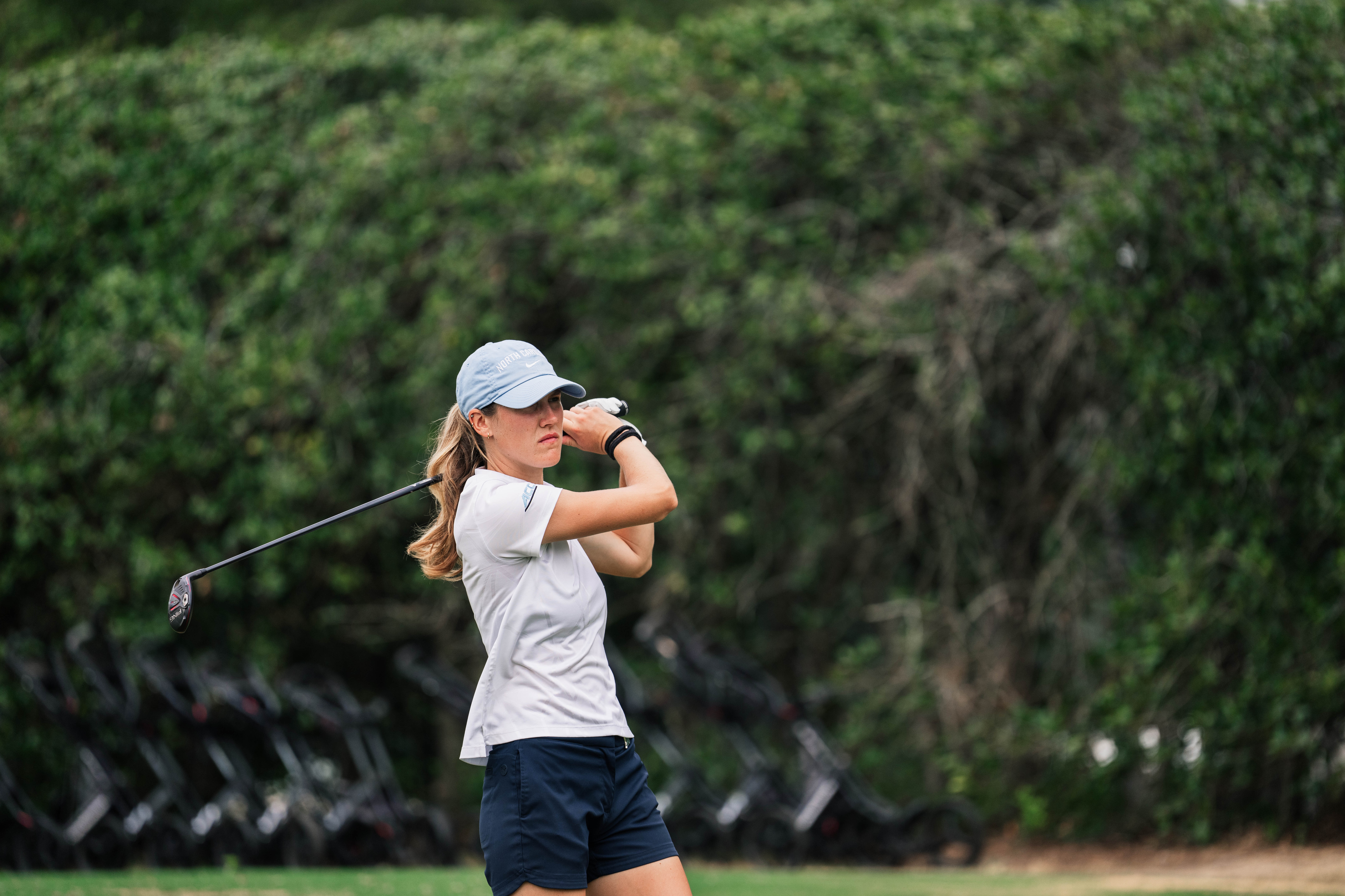 UNC's Kayla Smith hits a shot during Thursday's round fo 32 matches in the 122nd North & South Women's Amateur.