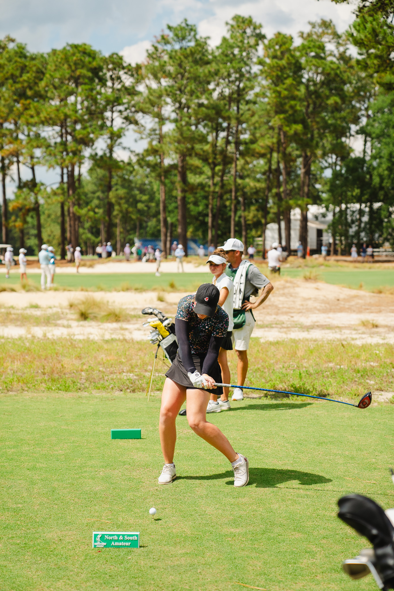 Catie Craig tees off during Saturday's North & South final.