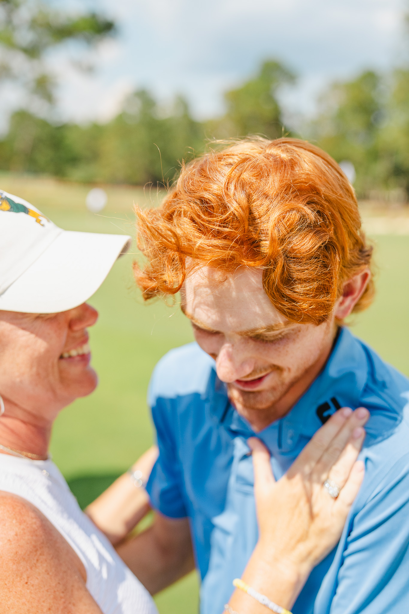 Davis Ovard greets his mother after winning the North & South Amateur.